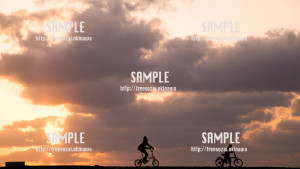 【豊崎ビーチ】真っ赤な空をツーリング 写真素材